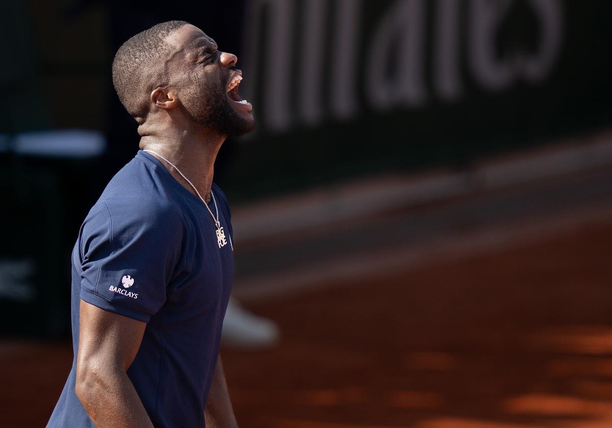 May 28, 2026; Paris, France; Frances Tiafoe of the United States celebrates winning his match against Hubert Hurkacz of Poland on day five at Stade Roland Garros. Mandatory Credit: Susan Mullane-Imagn Images