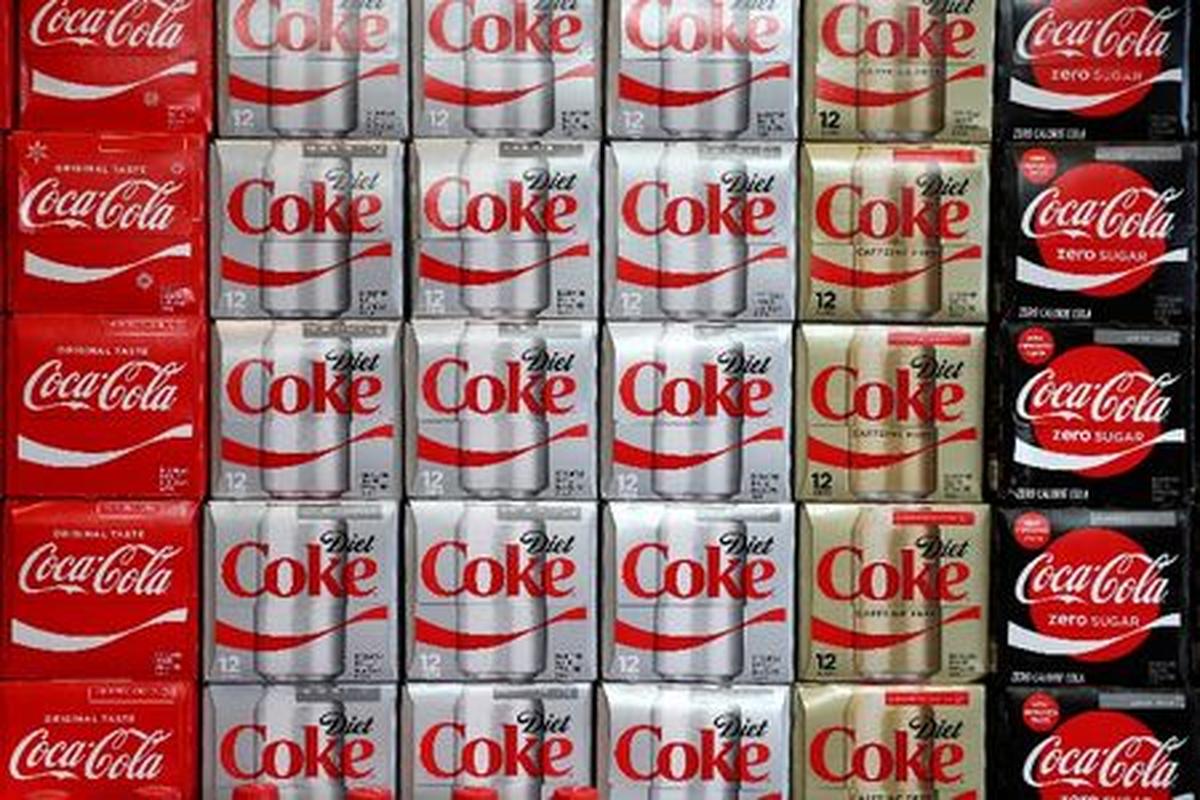 FILE PHOTO: Boxes of Coca-Cola are seen at a grocery store in Los Angeles, California U.S. November 21, 2017. REUTERS/Lucy Nicholson/File Photo