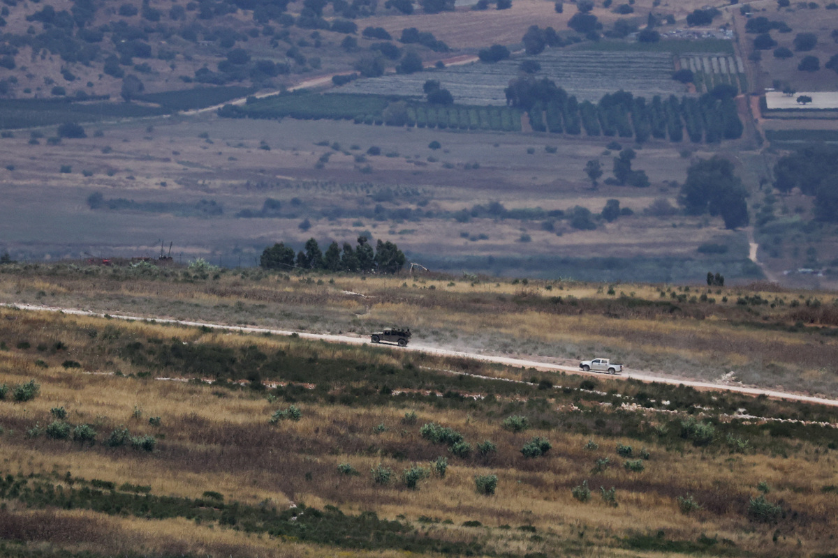 Israeli vehicles drive in southern Lebanon, as seen from the Israeli side of the Israel-Lebanon border, in northern Israel, June 10, 2026. REUTERS/Ammar Awad