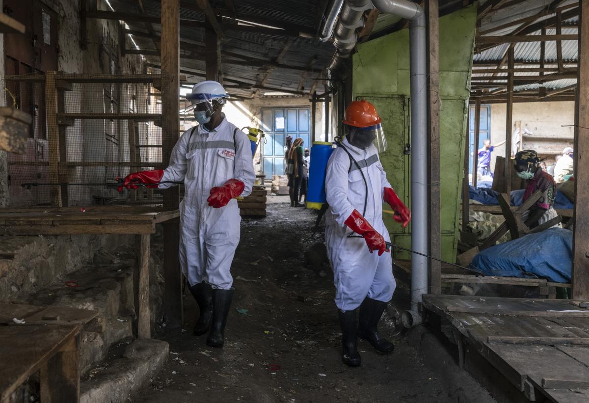 HEADLINE: In City at Heart of Ebola Heartbreak, 'the Virus is Far Ahead of Us'.CAPTION: Health workers disinfect a public market in Bunia, as part of the response to the Ebola outbreak in the Democratic Republic of Congo, May 23, 2026. The deadly virus has spread alarmingly in Congo for months. Only now is the response taking shape. .CREDIT: (Arlette Bashizi/The New York Times)