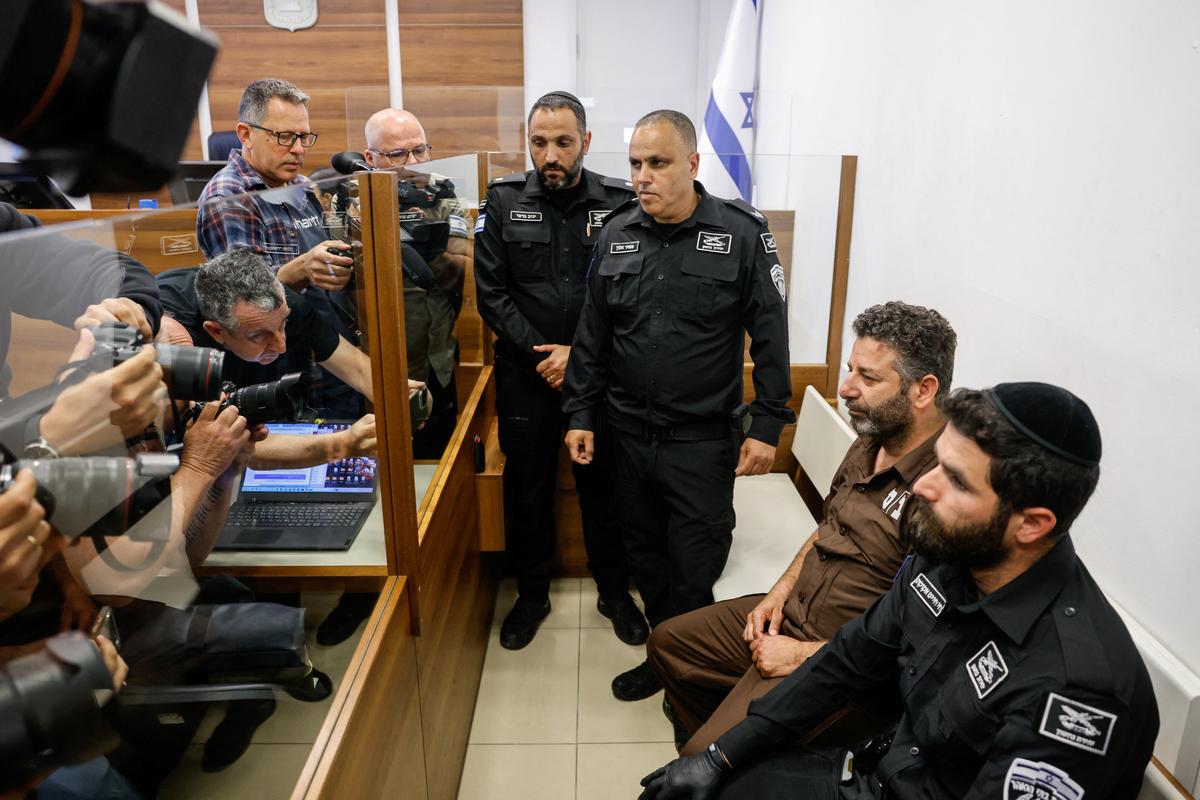 Activist Saif Abu Keshek, a member of the Global Sumud Flotilla detained by Israel, sits at a magistrate's court for a detention extension hearing in Ashkelon, southern Israel, May 3, 2026. REUTERS/Amir Cohen
