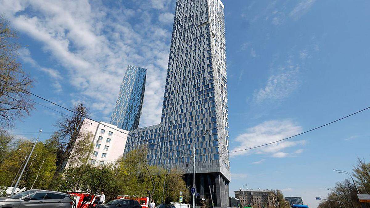 Damage to a high-rise residential building following a Ukrainian drone attack is seen in Moscow on Monday. Ukrainian drones are regularly hitting targets deep inside Russia, reaching the Ural Mountains and communities where most people had seen the war as a distant problem.