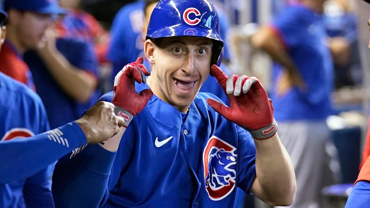 Chicago Cubs’ Frank Schwindel celebrates in the dugout after hitting a solo home run during the sixth inning of a baseball game against the Miami Marlins, Sunday, Aug. 15, 2021, in Miami. (AP Photo/Lynne Sladky)