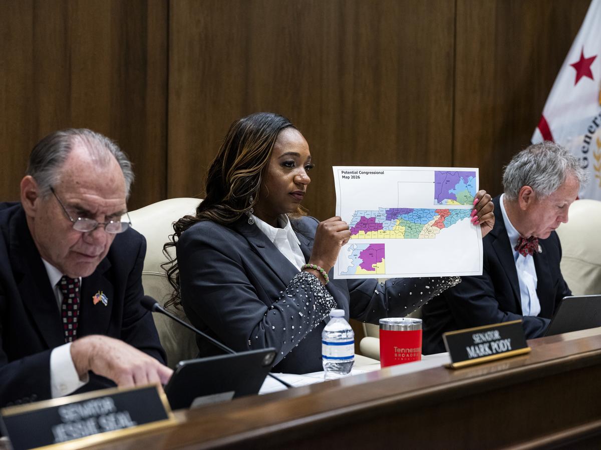 Tennessee State Sen. London Lamar holds up a potential congressional map after Republican legislators unveiled it in Nashville on Wednesday, May 6, 2026. Tennessee Republicans on Wednesday proposed a congressional map aimed at diluting the state's lone majority-Black district, a swift response to last week's Supreme Court ruling that weakened a landmark voting rights law. (Brad J. Vest/The New York Times)