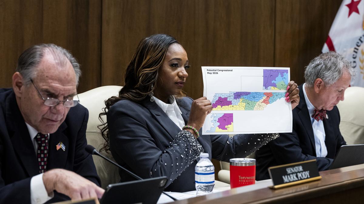 Tennessee state Sen. London Lamar holds up a potential congressional map after Republican legislators unveiled it in Nashville on Wednesday. Tennessee Republicans proposed a congressional map aimed at diluting the state's lone majority-Black district, a swift response to last week's Supreme Court ruling that weakened a landmark voting rights law.
