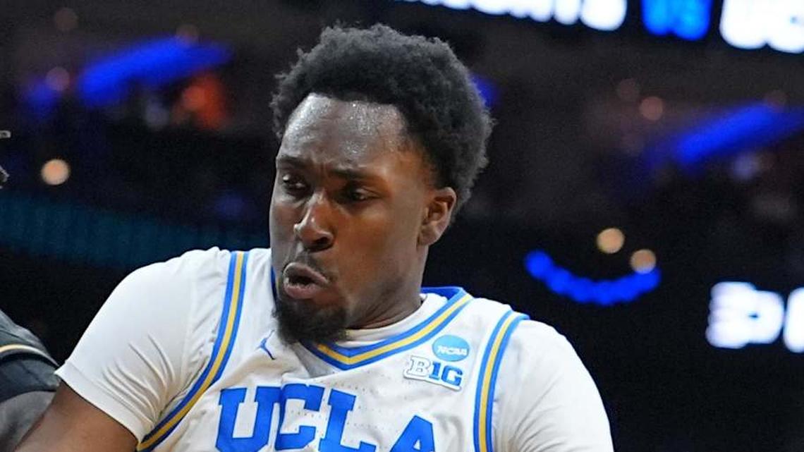  Mar 20, 2026; Philadelphia, PA, USA;UCF Knights center John Bol (7) grabs a rebound againist UCLA Bruins center Xavier Booker (1) in the first half during a first round game of the men's 2026 NCAA Tournament at Xfinity Mobile Arena. Mandatory Credit: Kyle Ross-Imagn Images | Kyle Ross-Imagn Images 