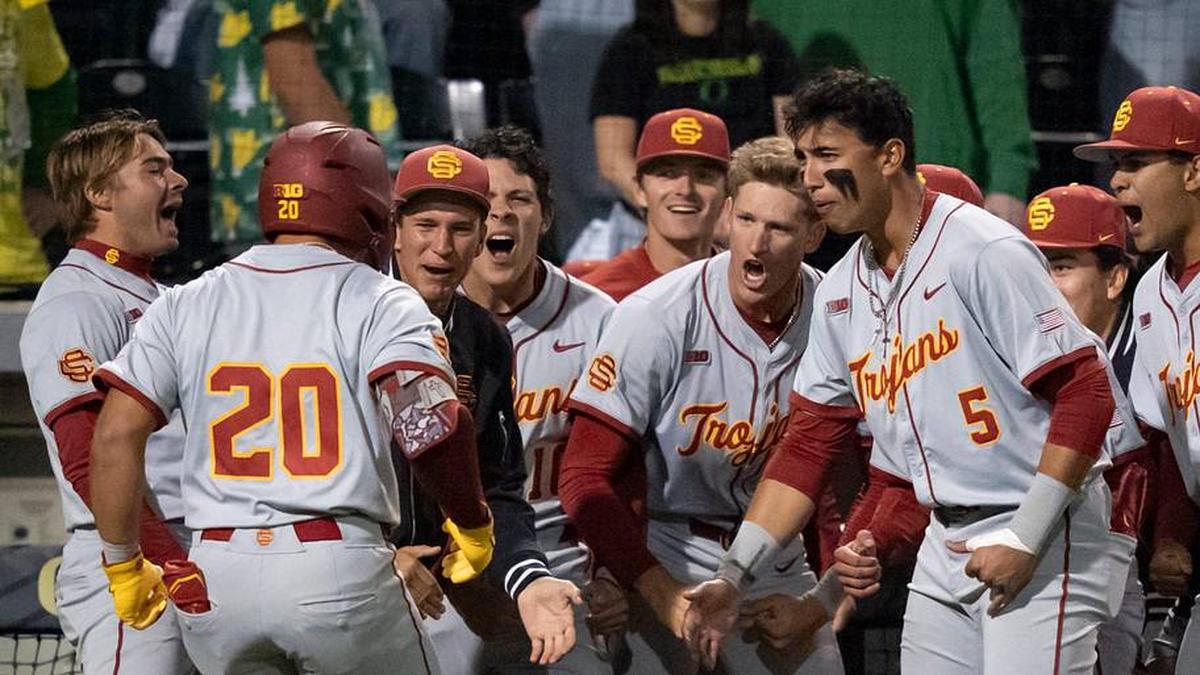  USC celebrates a home run by Isaac Cadena (20) as the Oregon Ducks host the USC Trojans on May 14, 2026, in Eugene, Oregon. | Ben Lonergan/The Register-Guard / USA TODAY NETWORK via Imagn Images 