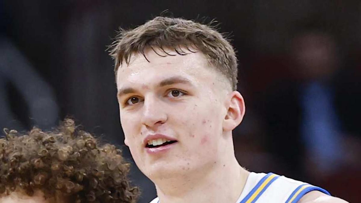  Mar 12, 2026; Chicago, IL, USA; UCLA Bruins guard Trent Perry (0) and forward Tyler Bilodeau (34) smile during the second half at United Center. Mandatory Credit: Kamil Krzaczynski-Imagn Images | Kamil Krzaczynski-Imagn Images 
