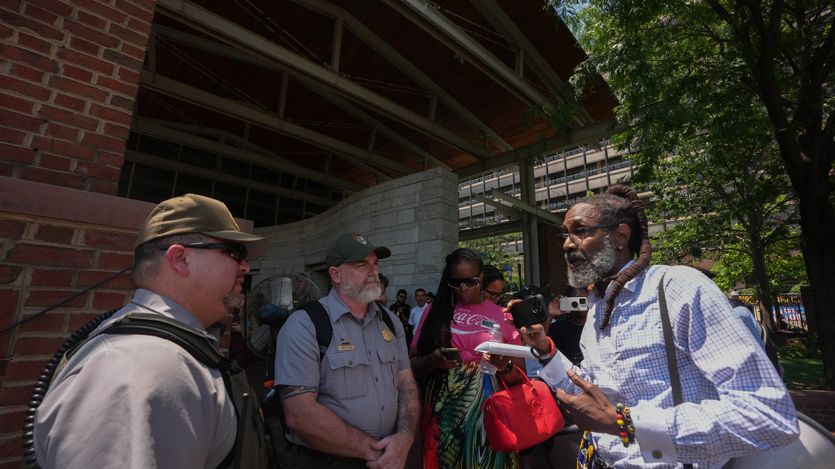 Lawyer Michael Coard advocates for his First Amendment rights to gather and speak freely at the President's House site on Wednesday, July 15, 2026, in Philadelphia. (Jessica Griffin/The Philadelphia Inquirer/TNS)