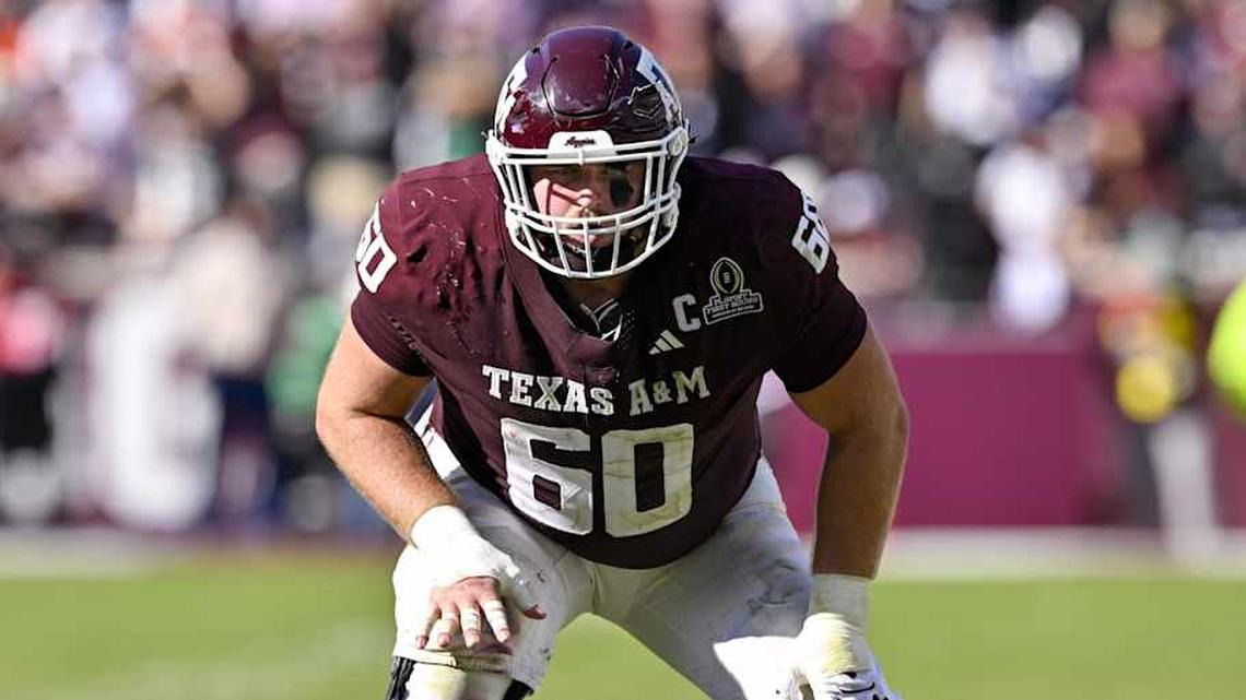  Dec 20, 2025; College Station, TX, USA; Texas A&M Aggies offensive lineman Trey Zuhn III (60) lines up during the game between the Aggies and the Hurricanes at Kyle Field. Mandatory Credit: Jerome Miron-Imagn Images | Jerome Miron-Imagn Images 