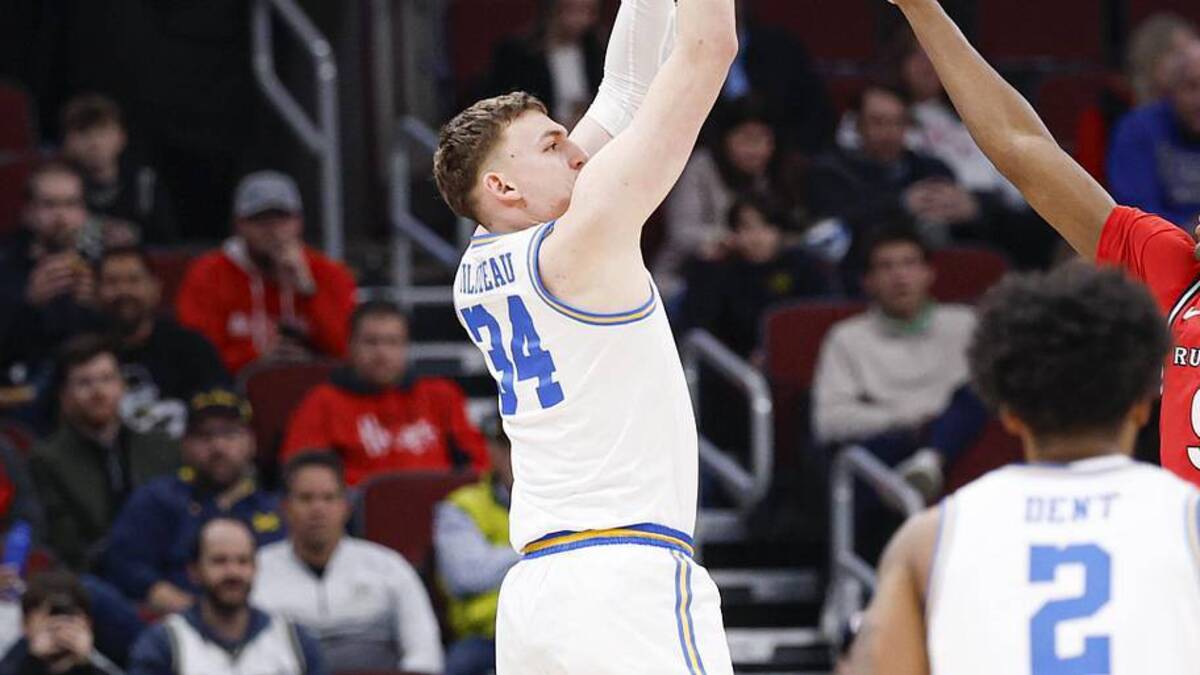  Mar 12, 2026; Chicago, IL, USA; UCLA Bruins forward Tyler Bilodeau (34) shoots against the Rutgers Scarlet Knights during the first half at United Center. Mandatory Credit: Kamil Krzaczynski-Imagn Images | Kamil Krzaczynski-Imagn Images 