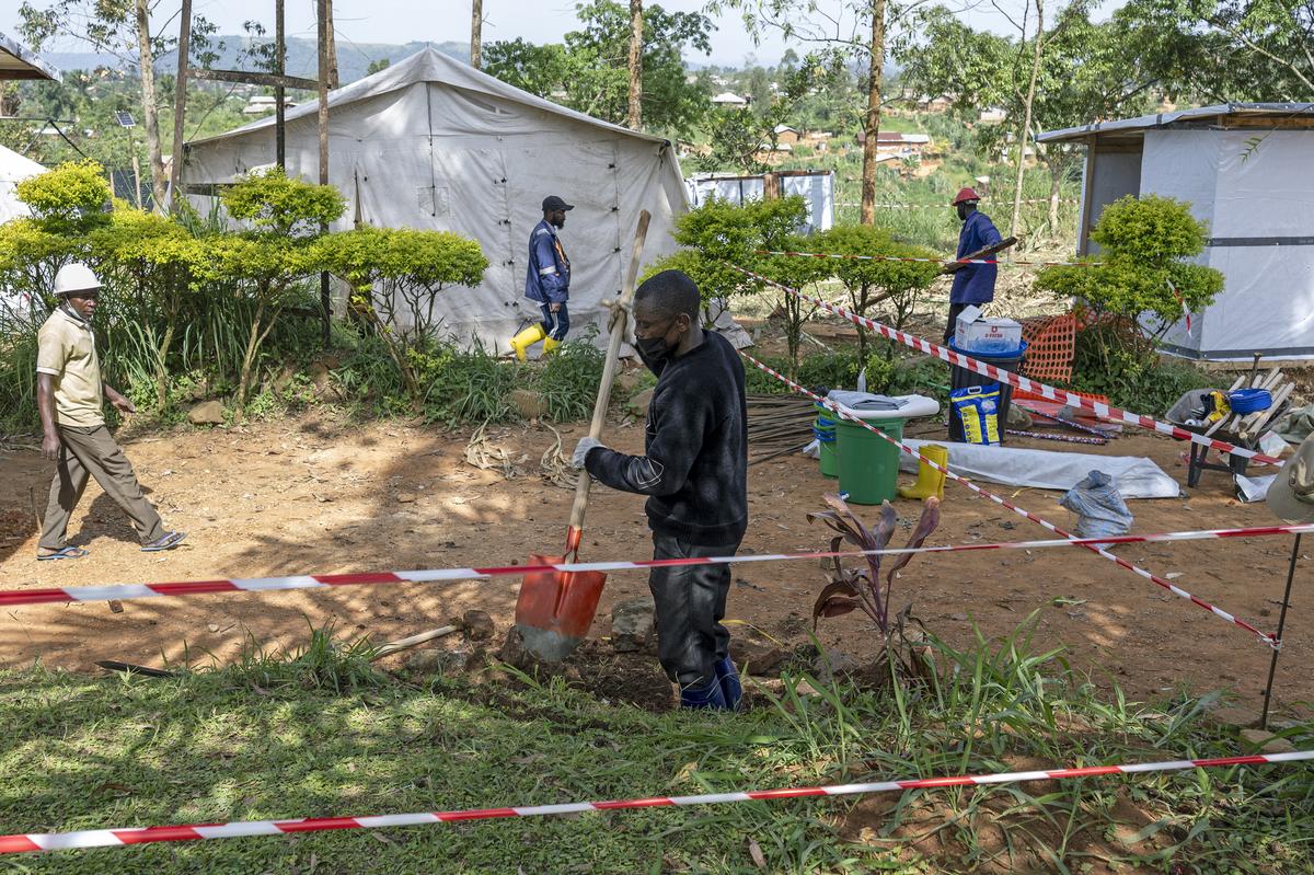 Workers set up a treatment center run by Doctors Without Borders in Mongbwalu, which is at the epicenter of the Ebola virus outbreak in Democratic Republic of Congo, May 26, 2026. In a remote gold mining town at the epicenter of the Ebola outbreak, medical workers struggle to beat back a surge of deaths and infections. (Arlette Bashizi/The New York Times)