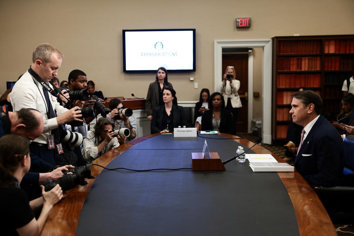 Acting U.S. Attorney General Todd Blanche looks on, as members of the media take pictures, on the day he is to testify before a House Appropriations Commerce, Justice, Science, and Related Agencies Subcommittee oversight hearing on the Department of Justice, on Capitol Hill, in Washington, D.C., U.S., June 2, 2026. REUTERS/Evelyn Hockstein