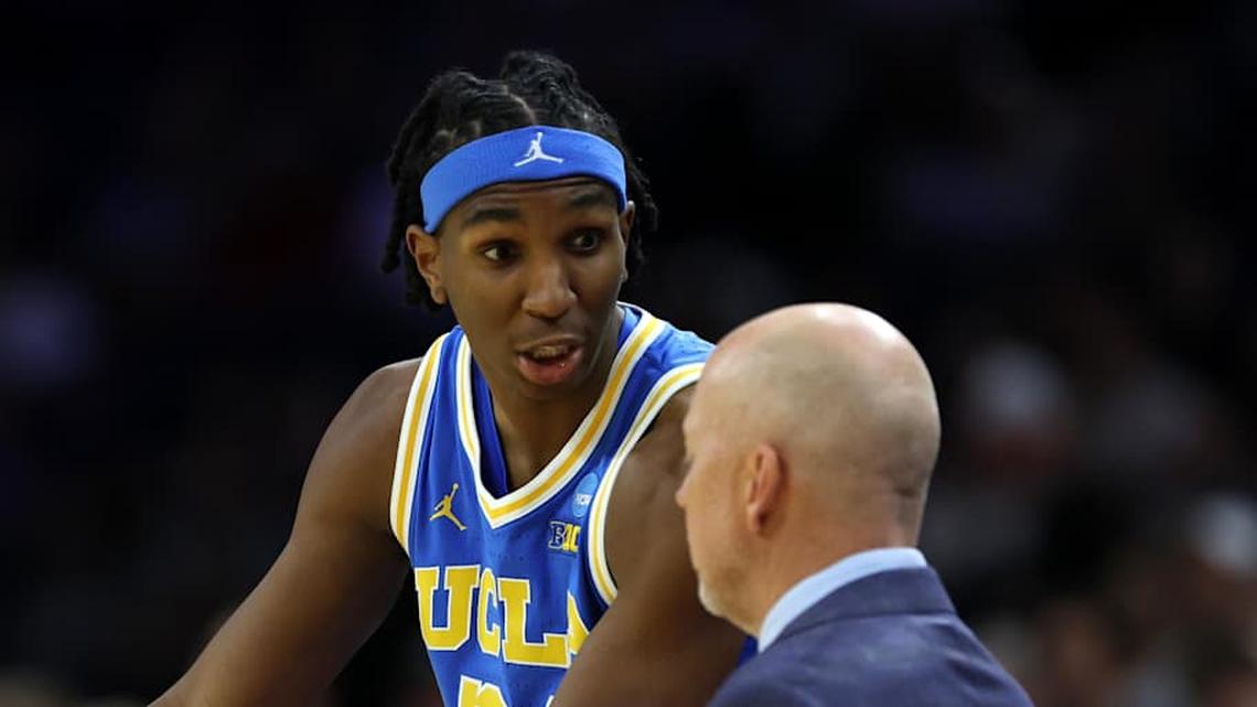  Mar 22, 2026; Philadelphia, PA, USA; UCLA Bruins center Steven Jamerson II (24) reacts with head coach Mick Cronin in the first half during a second round game of the men's 2026 NCAA Tournament at Xfinity Mobile Arena. Mandatory Credit: Bill Streicher-Imagn Images | Bill Streicher-Imagn Images 