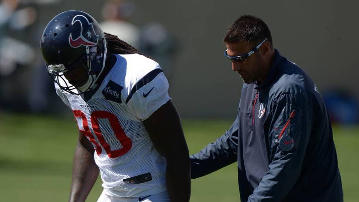  Aug 20, 2014; Englewood, CO, USA; Houston Texans linebackers coach Mike Vrabel and linebacker Jadeveon Clowney (90) during scrimmage against the Denver Broncos at the Broncos Headquarters. Mandatory Credit: Kirby Lee-Imagn Images | Kirby Lee-Imagn Images 