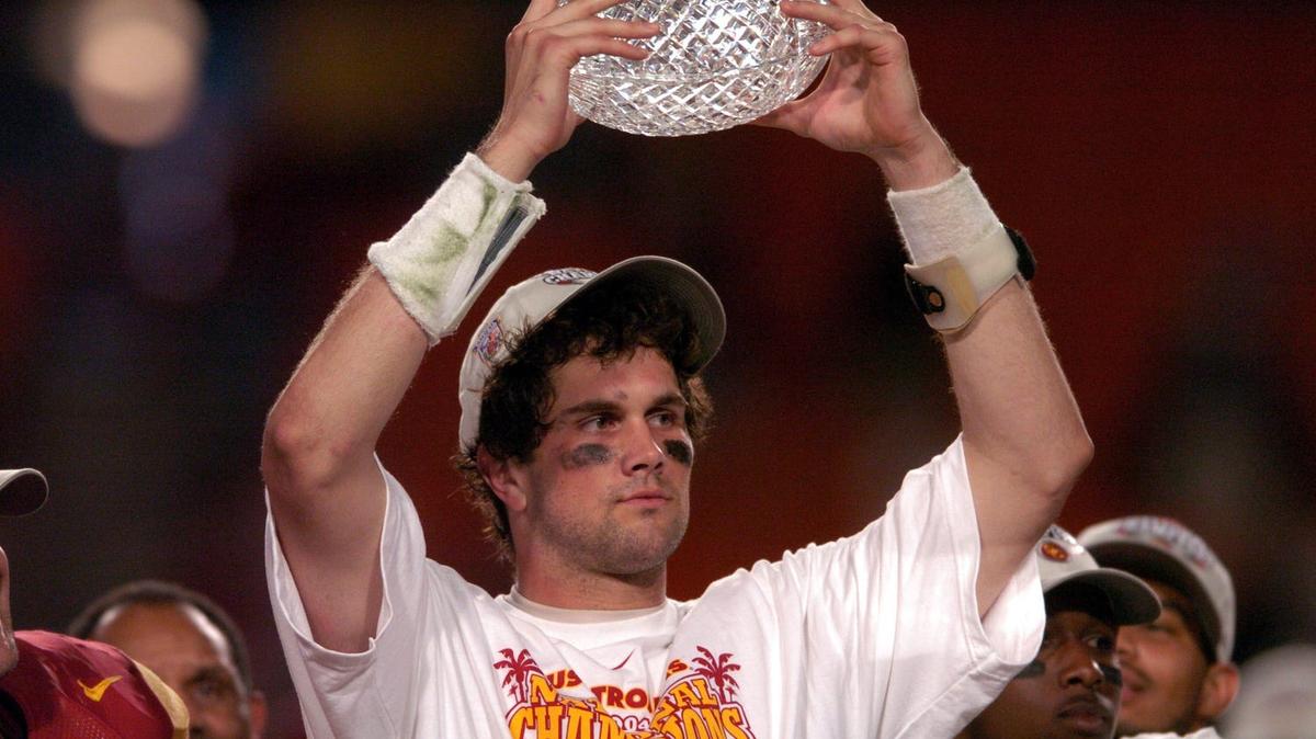 Jan 4, 2005; Miami Gardens, FL, USA; Southern California Trojans quarterback Matt Leinart holds the BCS National Championship trophy after 55-19 victory over Oklahoma in the FedEx Orange Bow at Pro Player Stadium. Mandatory Credit: Kirby Lee-USA TODAY Sports