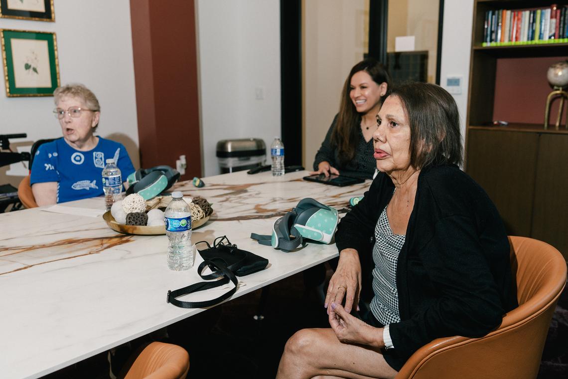 Pat Bridges, left, Tatiana Hernandez , center, and Mary Sue Escamilla, right, choose the next video to watch in the multi-purpose library at Castle Argyle in Los Angeles, Feb. 2, 2026. New tools tailored for use in senior living communities allow for shared experiences and social bonding. (Morgan Lieberman/The New York Times)