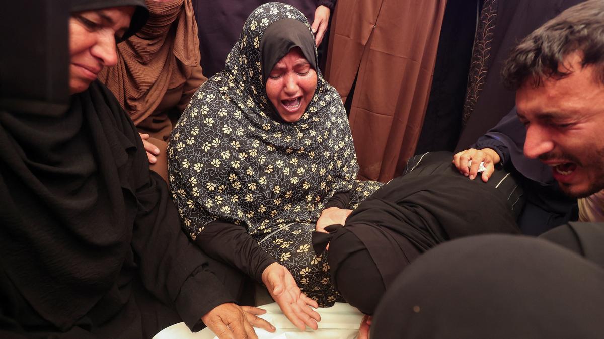 Mourners react during the funeral of six-year-old Palestinian girl Mennatallah Abu Libda, who was killed in an Israeli strike on a tent encampment for displaced families, according to medics, in Khan Younis in the southern Gaza Strip May 25, 2026. REUTERS/Ramadan Abed
