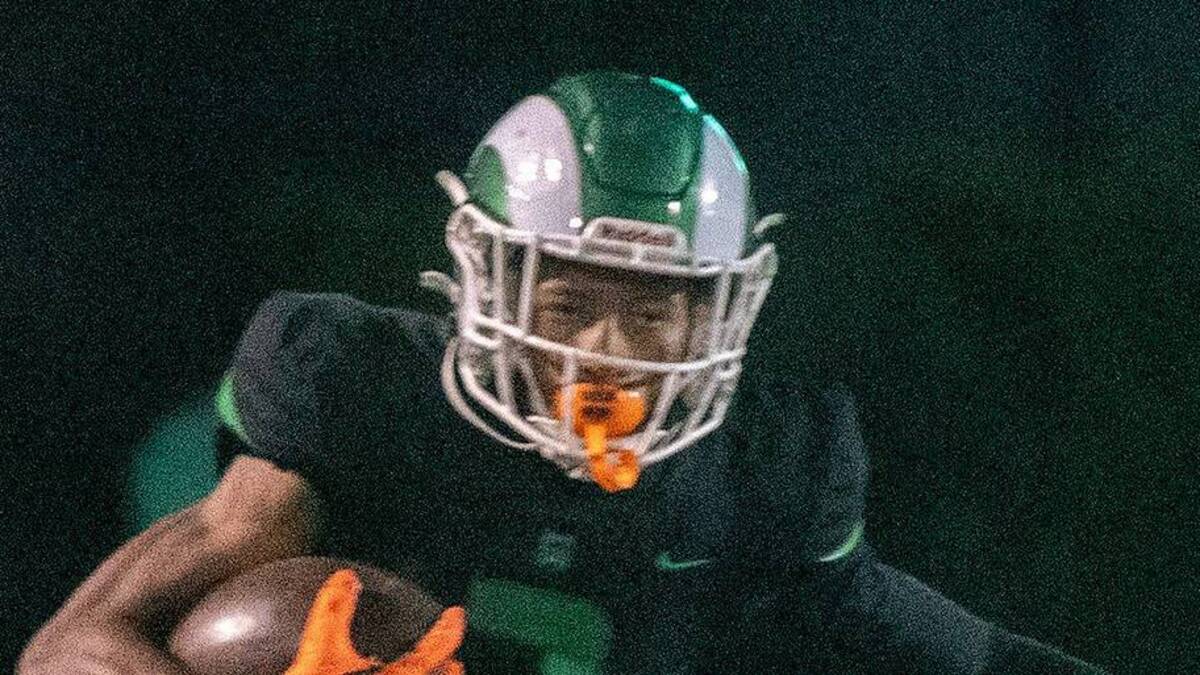  St. Mary's Kenneth Moore III, left, evades Edison's Elijah Wilkerson during a varsity football game at St. Mary's Sangunetti Field in Stockton on Oct. 18, 2024. St. Mary's won 35-23. | CLIFFORD OTO/THE STOCKTON RECORD / USA TODAY NETWORK via Imagn Images 