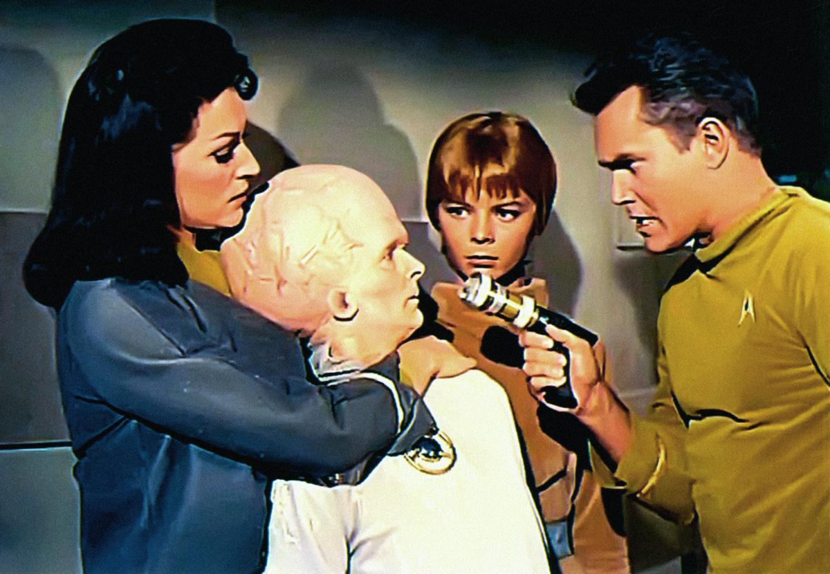 STAR TREK, Majel Barrett (left), Laurel Goodwin (2nd from right), Jeffrey Hunter (right), ‘The Cage’ (original pilot screened to NBC executives in Feb. 1965), (aired Nov. 27, 1988), 1966-69.Courtesy the Everett Collection