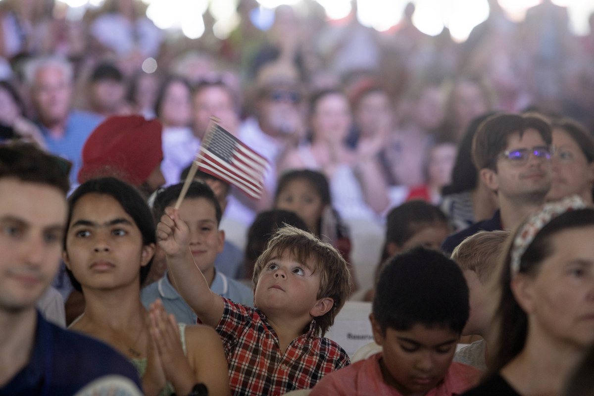 People attend a naturalization ceremony at Monticello in Charlottesville, Va., on July 4. 2026. America celebrates the 250th anniversary of its independence today, with people from one end of the country to the other marking the milestone with fireworks, parades and concerts. (Kirsten Luce/The New York Times)