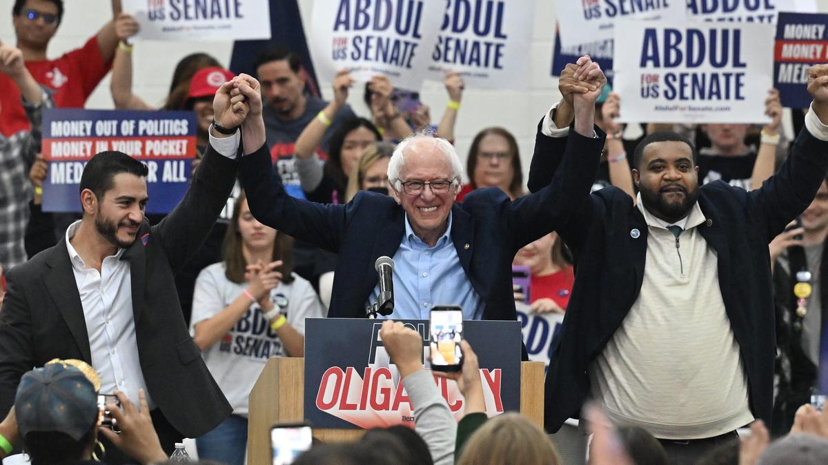 Abdul El-Sayed, running for Michigan U.S. Senate, Vermont Sen. Bernie Sanders and Donavan McKinney, running for Congress in Michigan's 13th District at Samuel C. Mumford High School in Detroit, Michigan during a rally on May 3, 2026. (Daniel Mears/The Detroit News/TNS)