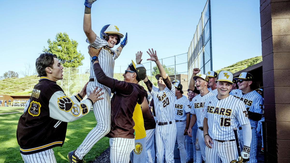 Temecula Valley’s Nayan Arrendas (3) is lifted into the air after his RBI double off Vista Murrieta pitcher Dylan Solis (17) in the Southwestern League baseball game in Temecula on Tuesday, April 28, 2026. (Photo by Terry Pierson, The Press-Enterprise/SCNG)