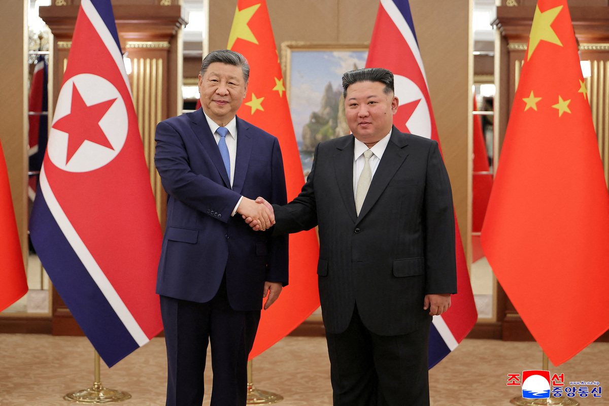 Chinese President Xi Jinping shakes hands with North Korean leader Kim Jong Un during Xi's state visit to Pyongyang, North Korea, June 8, 2026, in this picture released by North Korea's official Korean Central News Agency.   KCNA via REUTERS