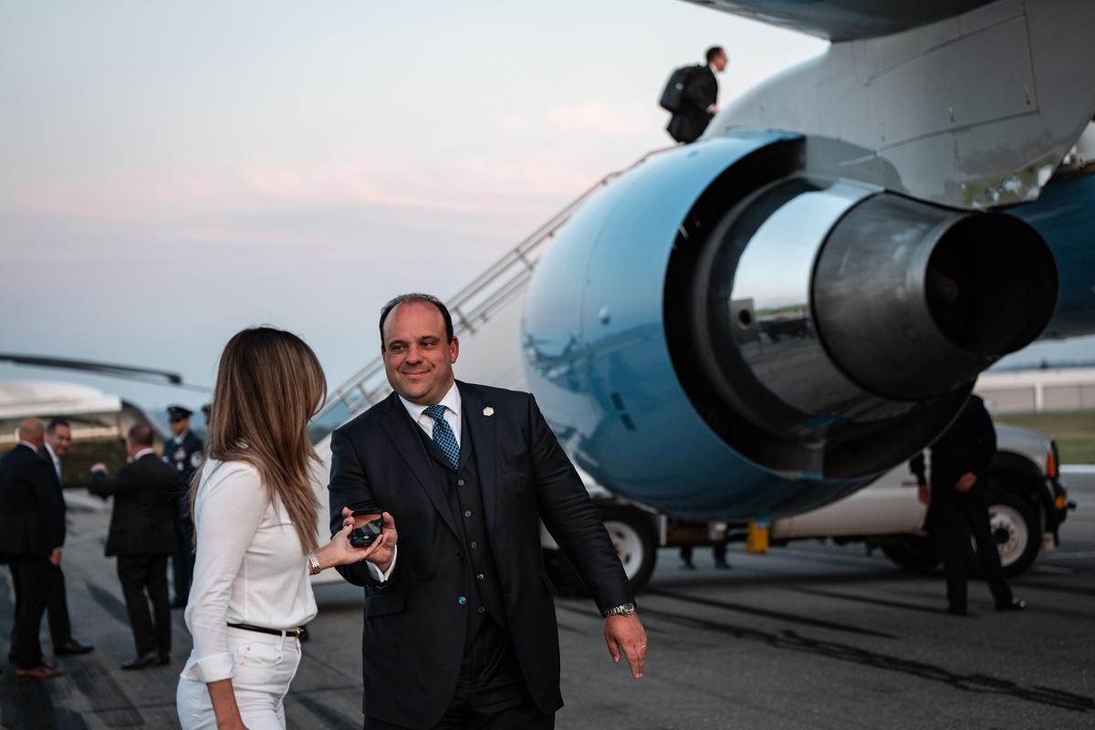 FILE --Boris Epshteyn, former lawyer for President Donald Trump, with Air Force One before he departs Lehigh Valley International Airport, Allentown, Penn., Aug. 3, 2025. Discussions among a group of lawyers with allegiance to the president were closely held. Some senior White House officials were said to have felt blindsided as the agreement took shape. (Haiyun Jiang/The New York Times)