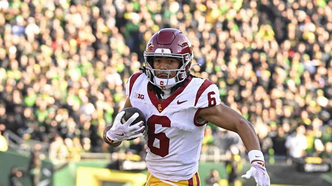  Nov 22, 2025; Eugene, Oregon, USA; Southern California Trojans wide receiver Makai Lemon (6) runs with the ball during the first half against the Oregon Ducks at Autzen Stadium. Mandatory Credit: Troy Wayrynen-Imagn Images | Troy Wayrynen-Imagn Images 