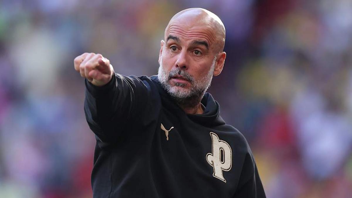  Pep Guardiola has a contract until 2027. | Michael Regan-The FA/The FA/Getty Images 