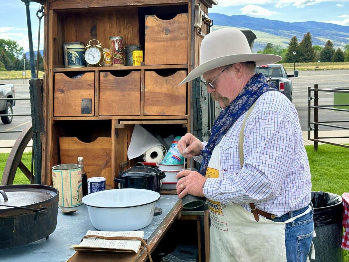  2 Mules Chuckwagon cook Rich Herman preps dinner. Photo credit: Cathy Bennett Kopf 