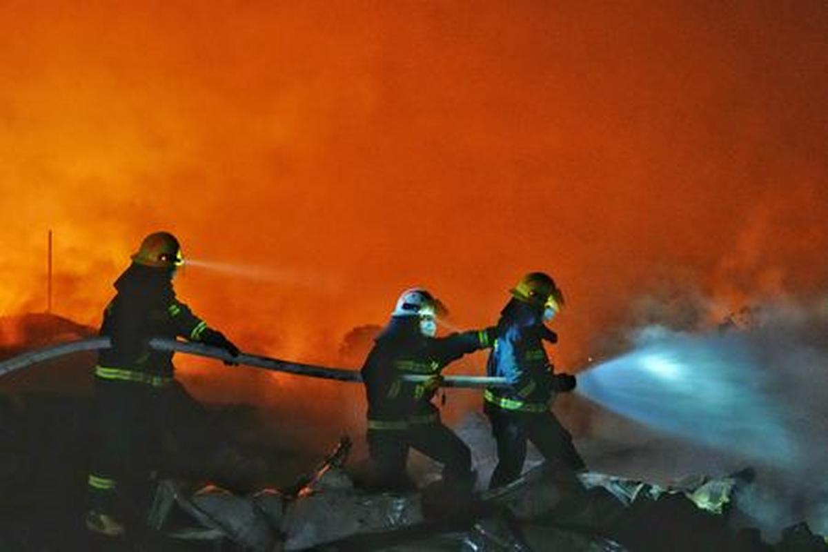 Firefighters work to extinguish a fire following a blast at a fireworks manufacturing factory in Liuyang, Hunan province, China, May 5, 2026. cnsphoto via REUTERS