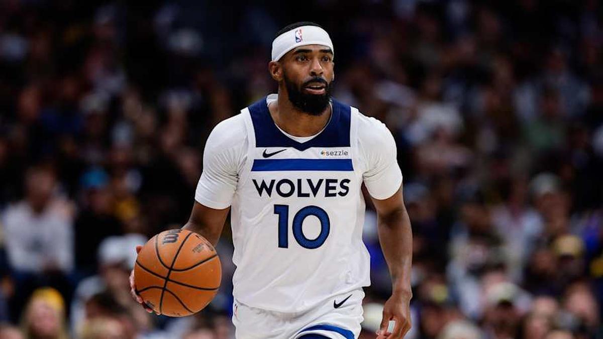  Apr 27, 2026; Denver, Colorado, USA; Minnesota Timberwolves guard Mike Conley (10) dribbles the ball up court in the first quarter against the Denver Nuggets during game five of the first round of the 2026 NBA Playoffs at Ball Arena. | Isaiah J. Downing-Imagn Images 