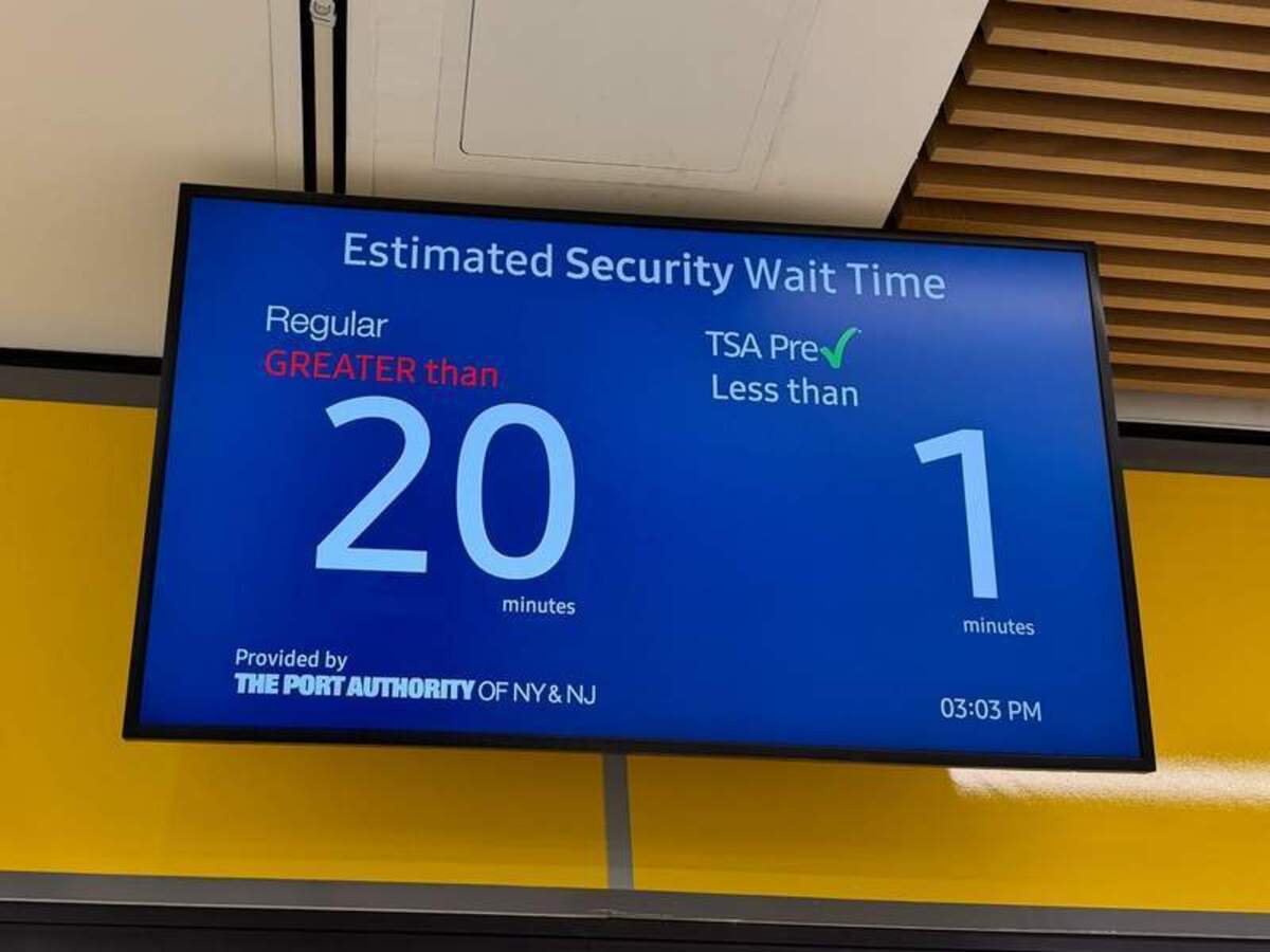  TSA Precheck wait time sign at the airport. Photo credit: Kim Orlando 