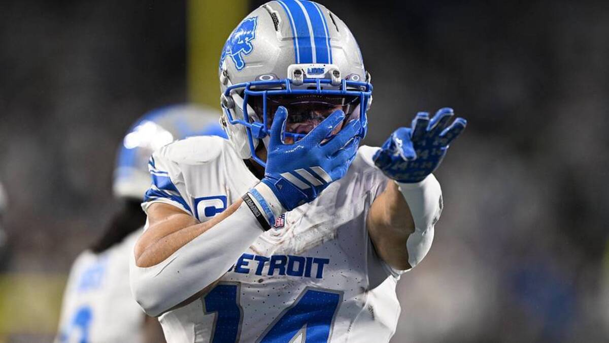  Detroit Lions wide receiver Amon-Ra St. Brown (14) celebrates after a play during the first half against the Dallas Cowboys at Ford Field. | Lon Horwedel-Imagn Images 