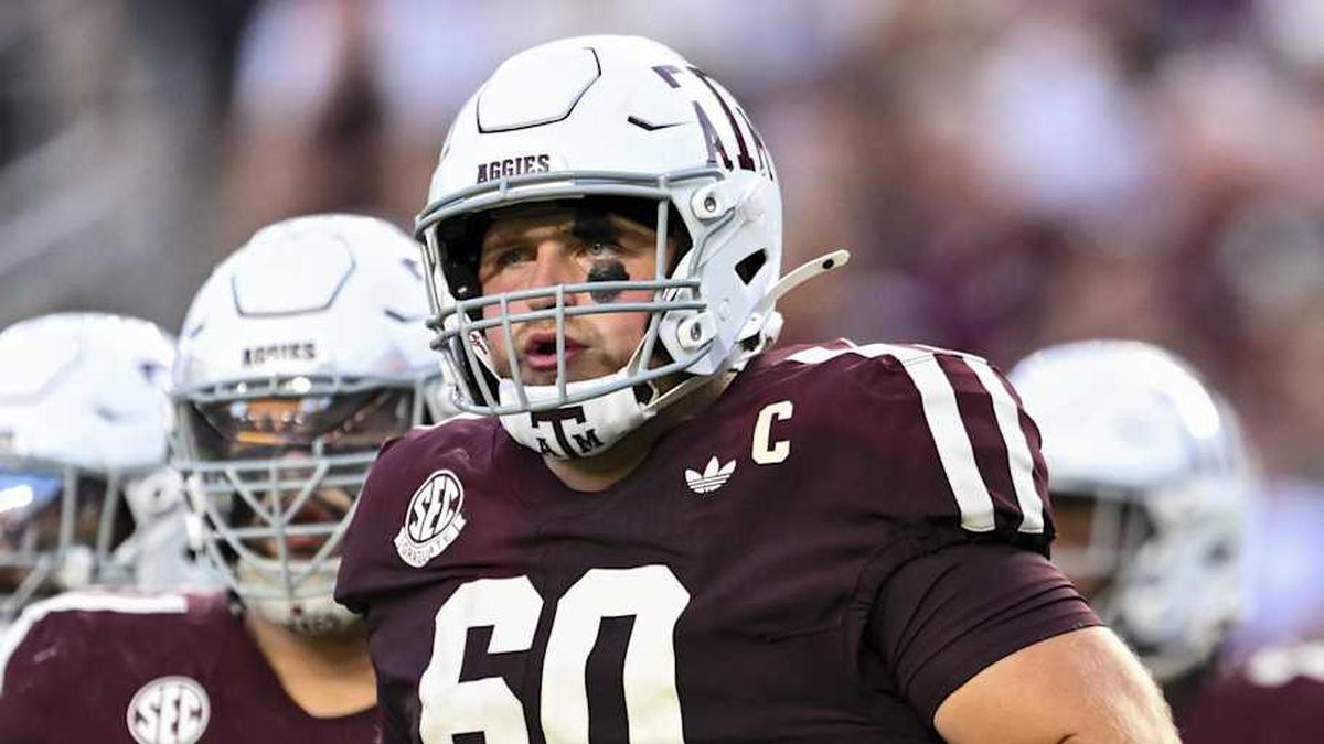  Oct 11, 2025; College Station, Texas, USA; Texas A&M Aggies offensive lineman Trey Zuhn III (60) and the offense runs onto the field in the first half against the Florida Gators at Kyle Field. Mandatory Credit: Maria Lysaker-Imagn Images | Maria Lysaker-Imagn Images 