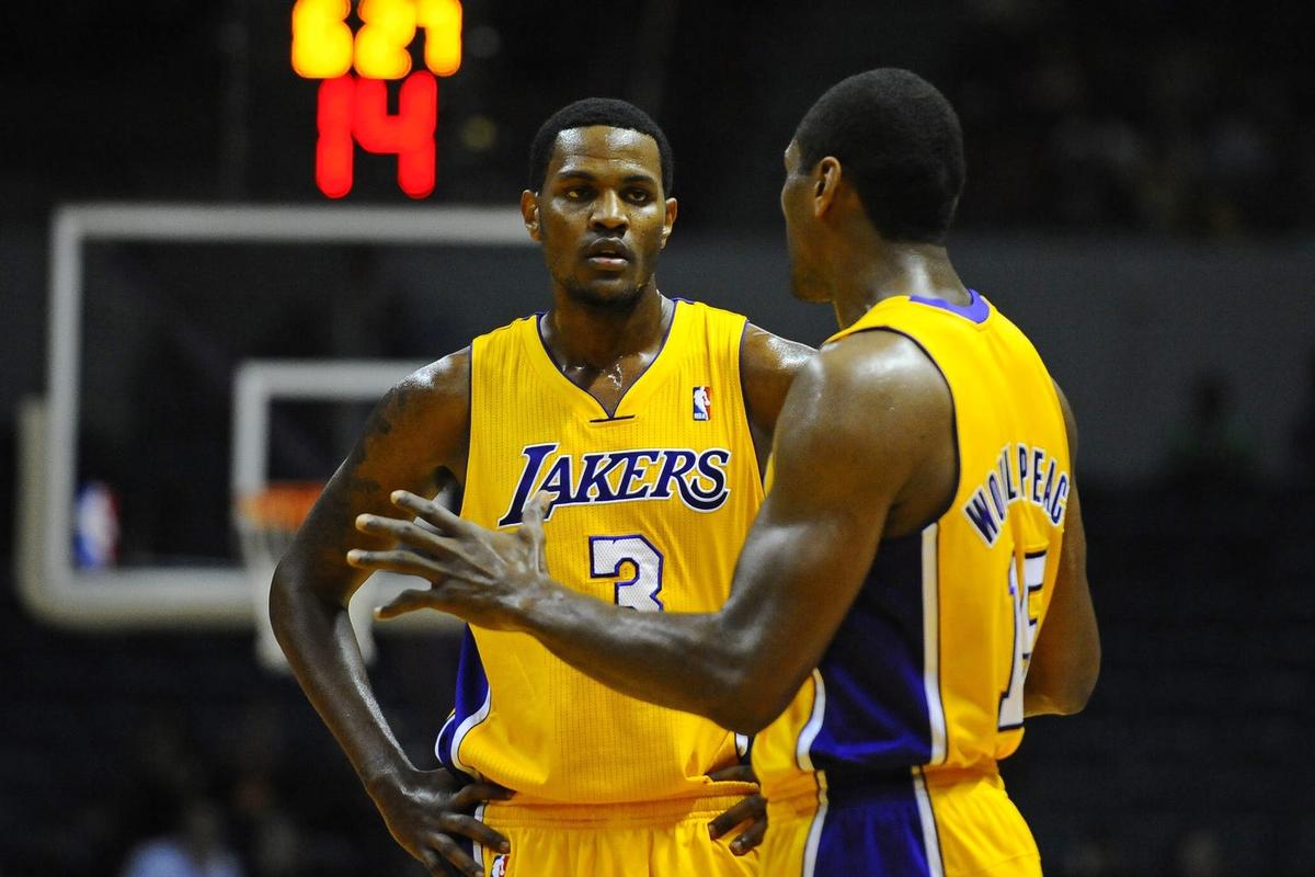 October 25, 2012; San Diego, CA, USA; Los Angeles Lakers forward Metta World Peace (15) talks with forward Devin Ebanks (3) during the first quarter against the Sacramento Kings at Valley View Casino Center. Mandatory Credit: Christopher Hanewinckel-USA TODAY Sports