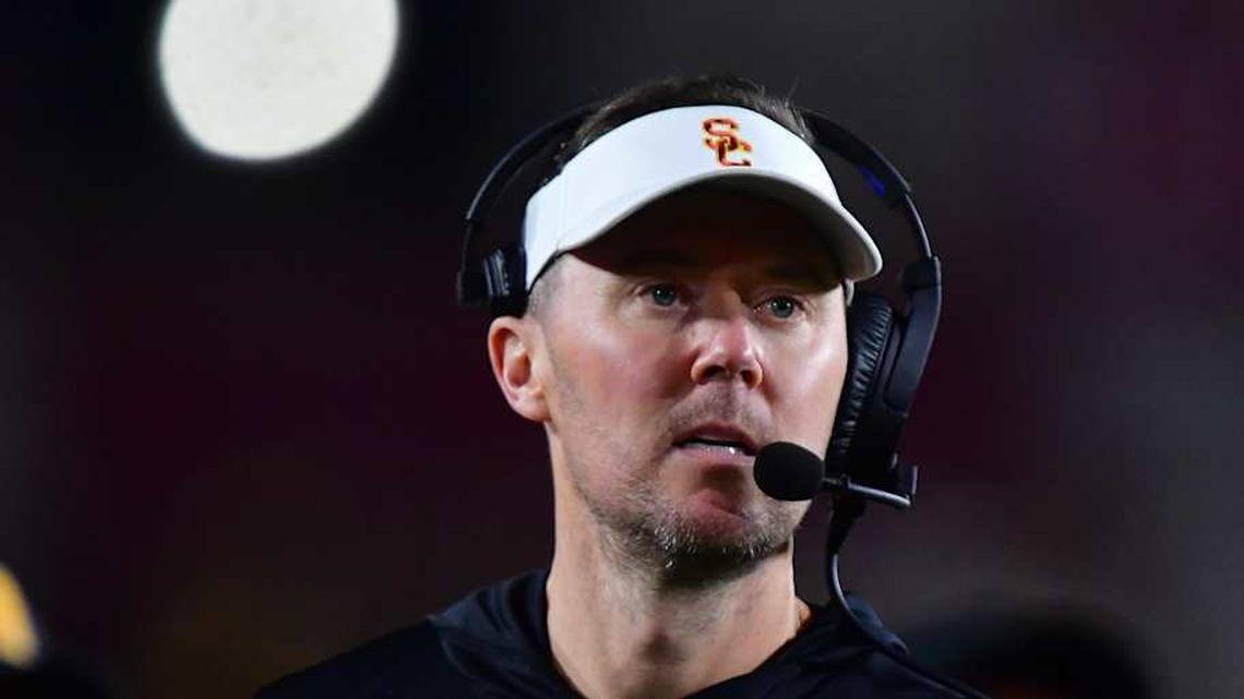  Nov 7, 2025; Los Angeles, California, USA; Southern California Trojans head coach Lincoln Riley watches game action against the Northwestern Wildcats during the second half at the Los Angeles Memorial Coliseum. Mandatory Credit: Gary A. Vasquez-Imagn Images | Gary A. Vasquez-Imagn Images 
