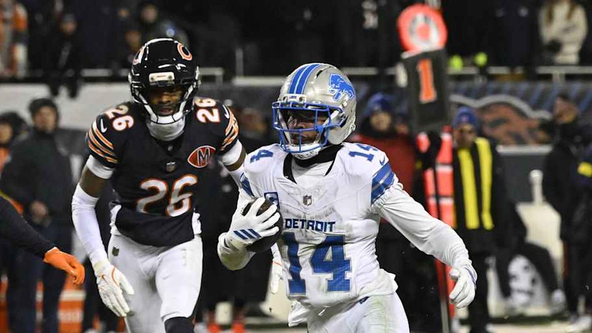  Jan 4, 2026; Chicago, Illinois, USA; Detroit Lions wide receiver Amon-Ra St. Brown (14) runs with the ball against the Chicago Bears during the second half at Soldier Field. Mandatory Credit: Matt Marton-Imagn Images | Matt Marton-Imagn Images 