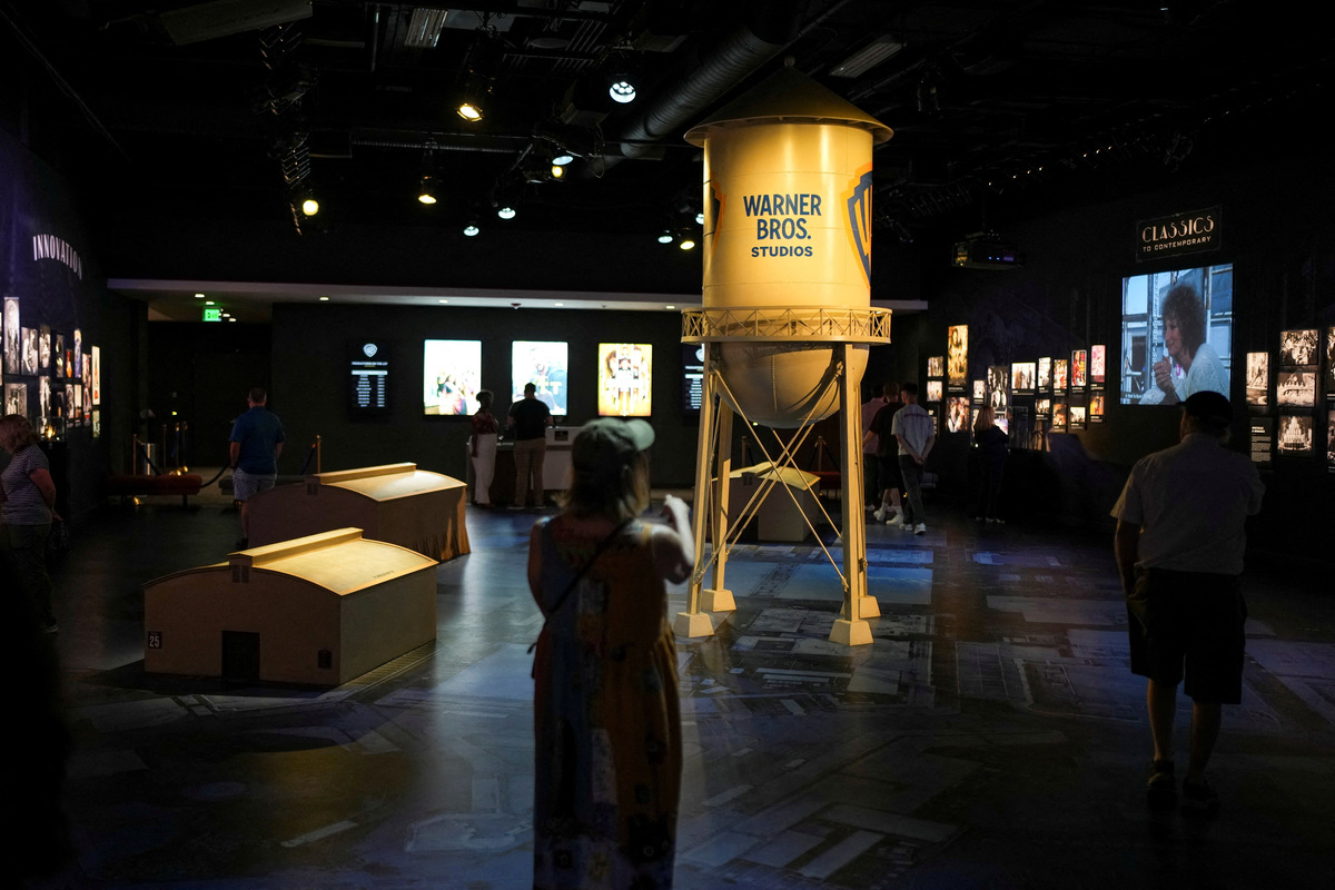 Visitors look through an exhibit during the Warner Bros. studio tour at Warner Bros. Studios in Burbank, California, U.S. February 27, 2026. REUTERS/Daniel Cole