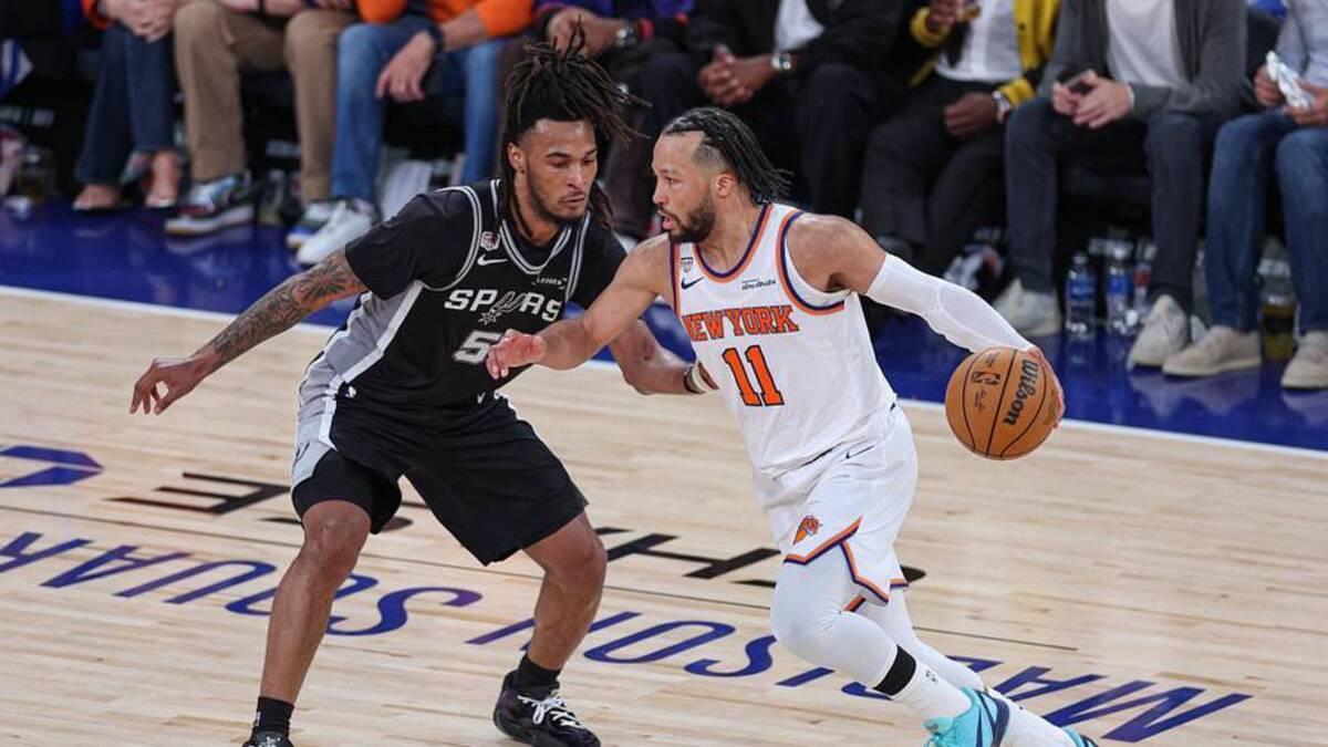  Jun 8, 2026; New York, New York, USA; New York Knicks guard Jalen Brunson (11) is guarded by San Antonio Spurs guard Stephon Castle (5) during game three of the 2026 NBA Finals at Madison Square Garden. | Vincent Carchietta-Imagn Images 