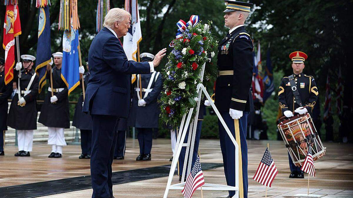 President Donald Trump participates in a Memorial Day wreath-laying ceremony at the Tomb of the Unknown Soldier at Arlington National Cemetery in Arlington, Virginia, on Monday.