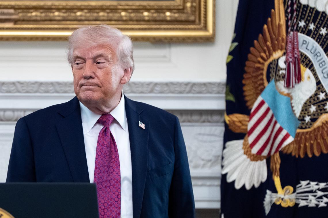  President Donald Trump departs after speaking at an event for NCAA national champions in the State Dining Room of the White House, Tuesday, April 21, 2026, in Washington. (AP Photo/Alex Brandon) 