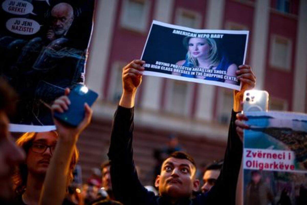 Protesters hold banners during a protest against a luxury resort development planned by a company linked with Donald Trump's son-in-law, Jared Kushner, on an environmentally sensitive part of the Adriatic coast, in Tirana, Albania, June 4, 2026. REUTERS/Florion Goga