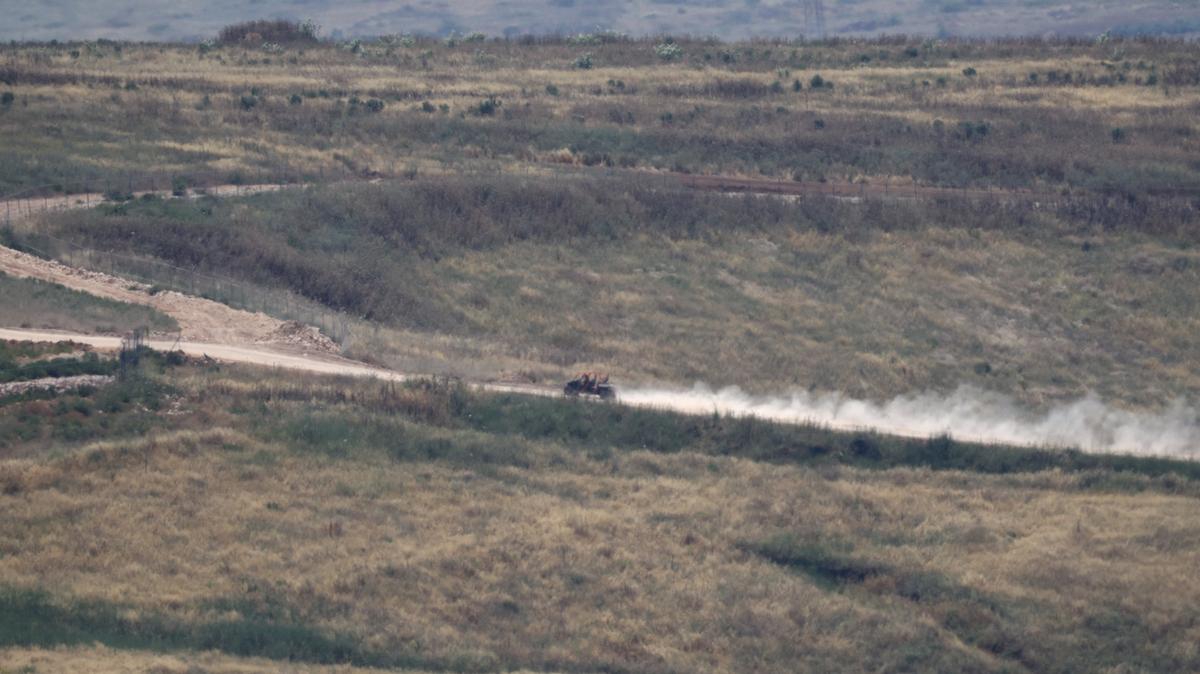 An Israeli military vehicle moves along a road in southern Lebanon, near the Israel-Lebanon border, as seen from northern Israel, June 2, 2026. REUTERS/Shir Torem