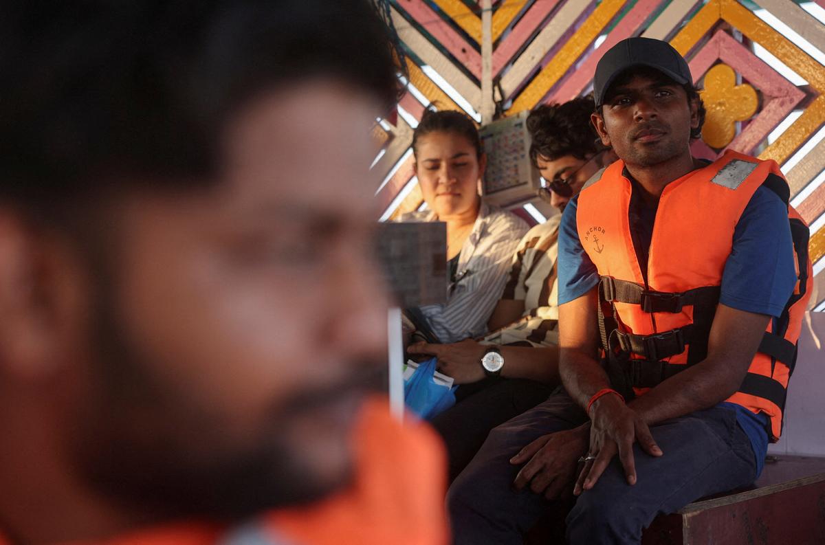 Tithi Chiranjeevi, an Indian seafarer who was stuck in Iran during the conflict, travels on a ferry in Mumbai, India, May 6, 2026. REUTERS/Francis Mascarenhas