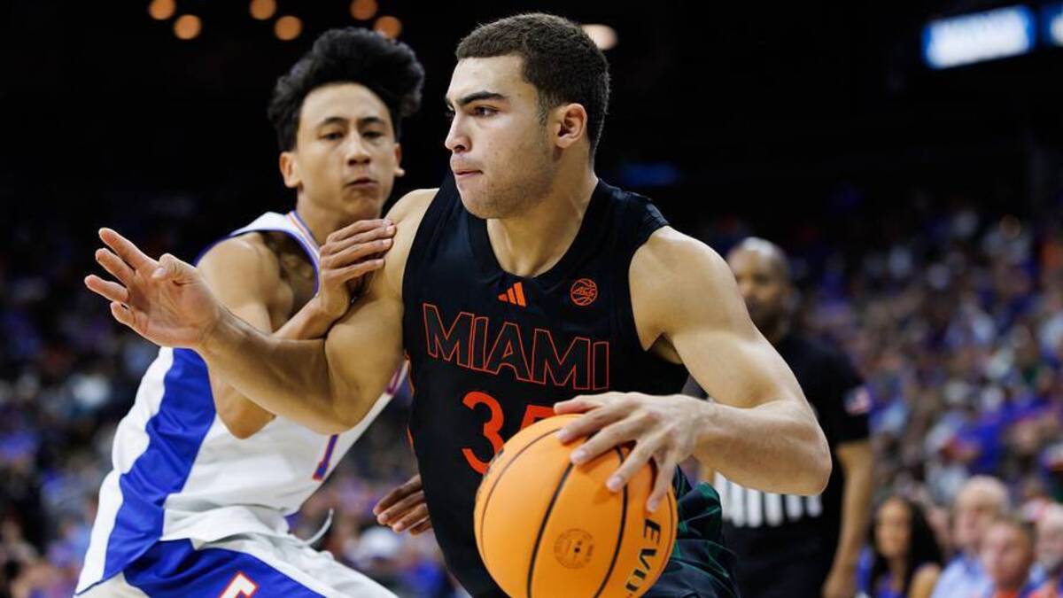  Nov 16, 2025; Jacksonville, Florida, USA; Miami Hurricanes guard Dante Allen (35) drives to the basket past Florida Gators guard Xaivian Lee (1) during the second half at VyStar Veterans Memorial Arena. Mandatory Credit: Matt Pendleton-Imagn Images | Matt Pendleton-Imagn Images 