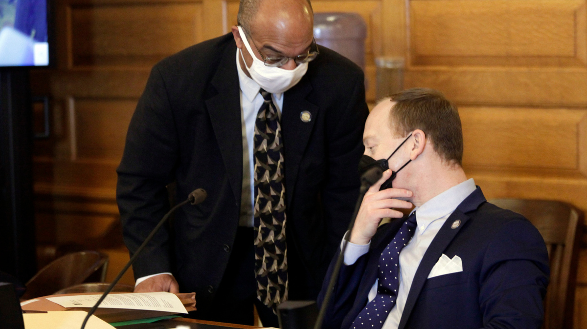 Kansas state Sens. David Haley, left, D-Kansas City, and Ethan Corson, D-Fairway, confer during a Senate Judiciary Committee meeting in March in Topeka. Both opposed a bill to ban all state and local mask mandates.