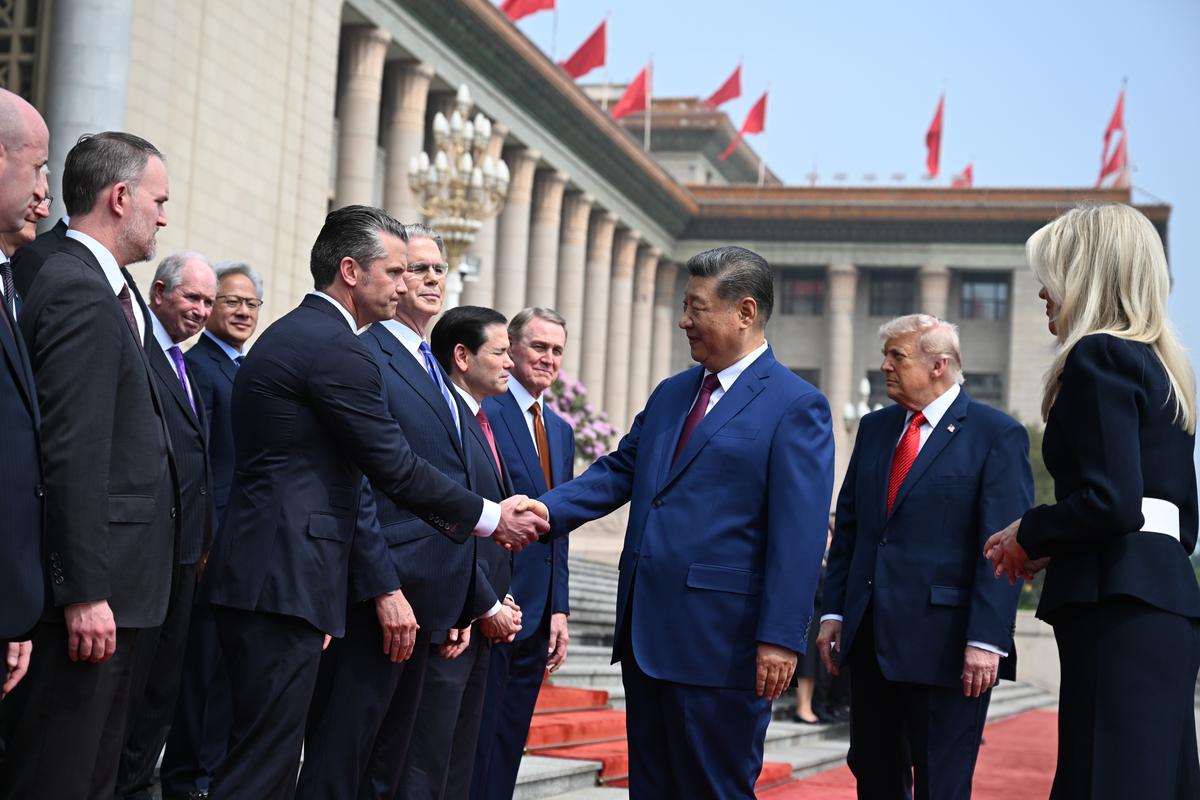 President Xi Jinping of China shakes hands with U.S. Defense Secretary Pete Hegseth as he and President Donald Trump, second right, arrived to the Great Hall of the People in Beijing during their two-day summit, on Thursday, May 14, 2026. During the first U.S. presidential visit to China in nearly a decade, Xi delivered a warning on Taiwan, saying that the issue, if handled poorly, could lead to conflict and "an extremely dangerous situation." (Kenny Holston/The New York Times)..